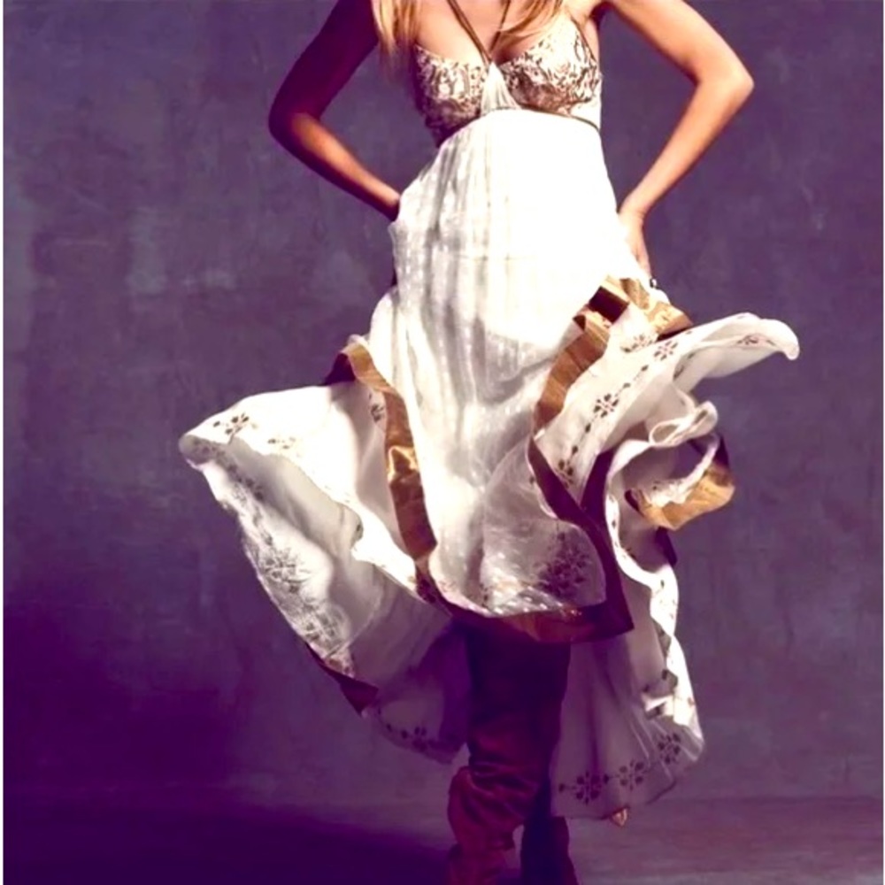 ISO Free People Snow Fall Party dress in size 4-8.